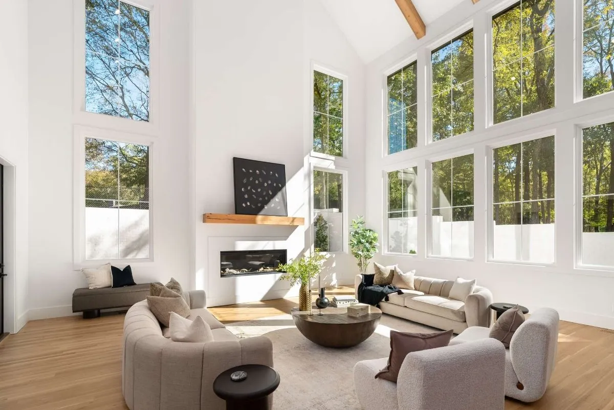 Great room with a two-story wall of windows