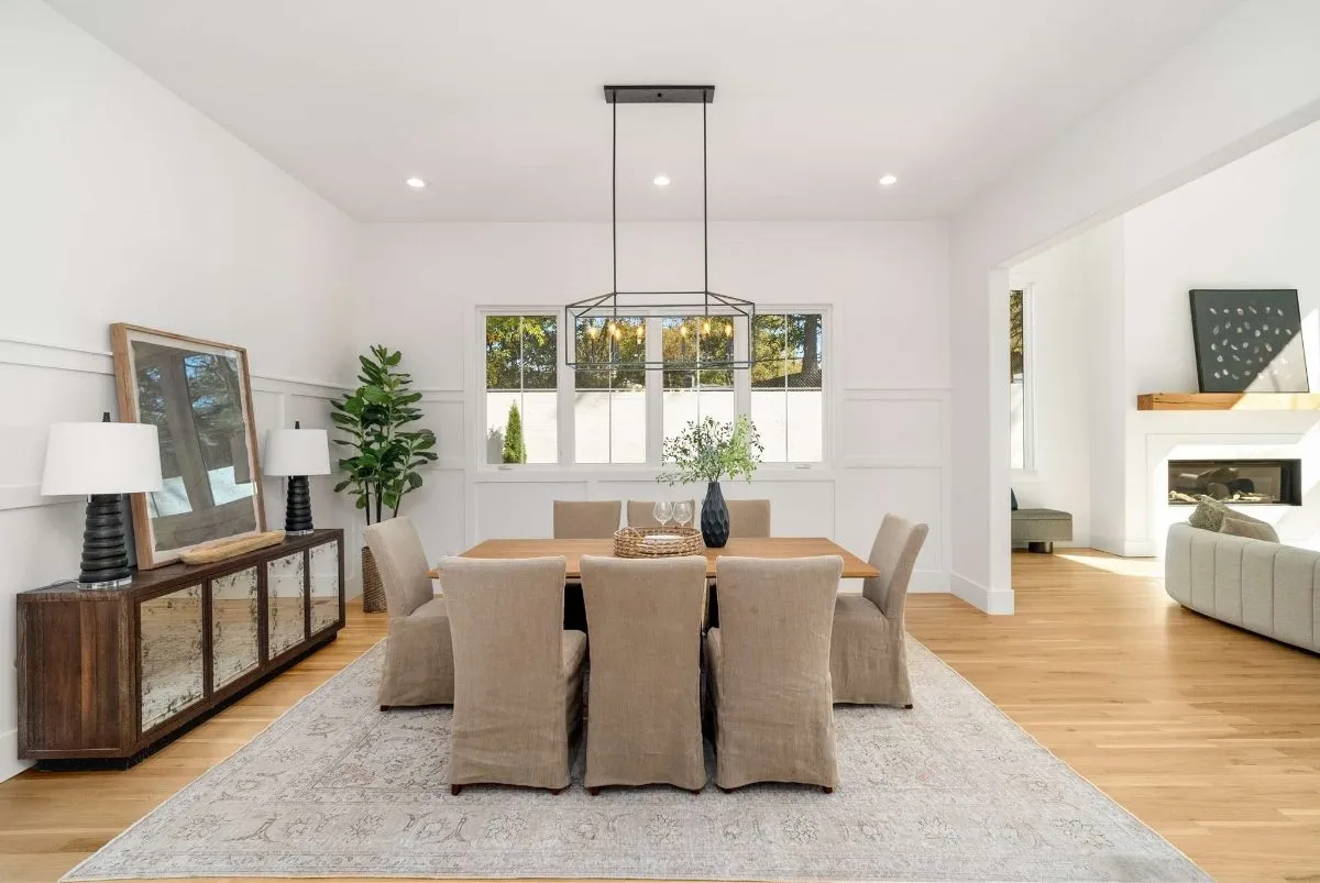 Dining room with a linear chandelier
