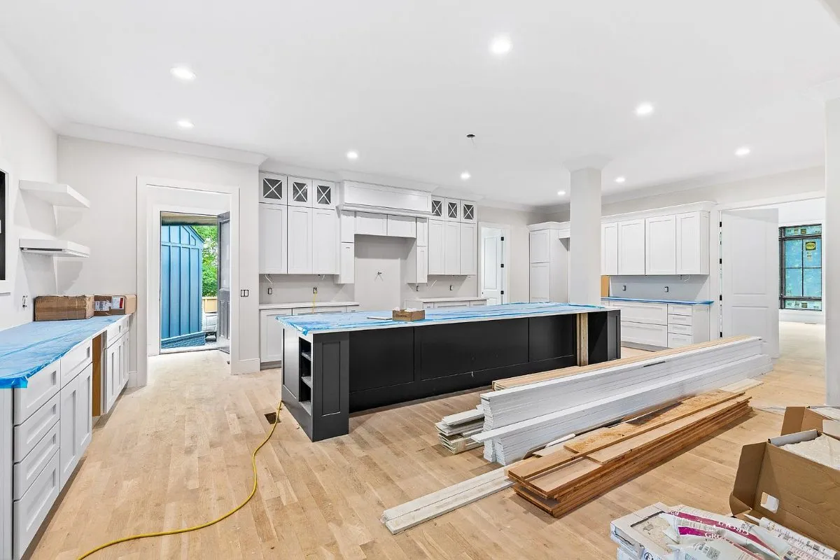 Kitchen island and cabinet run, with trim boards waiting to go in