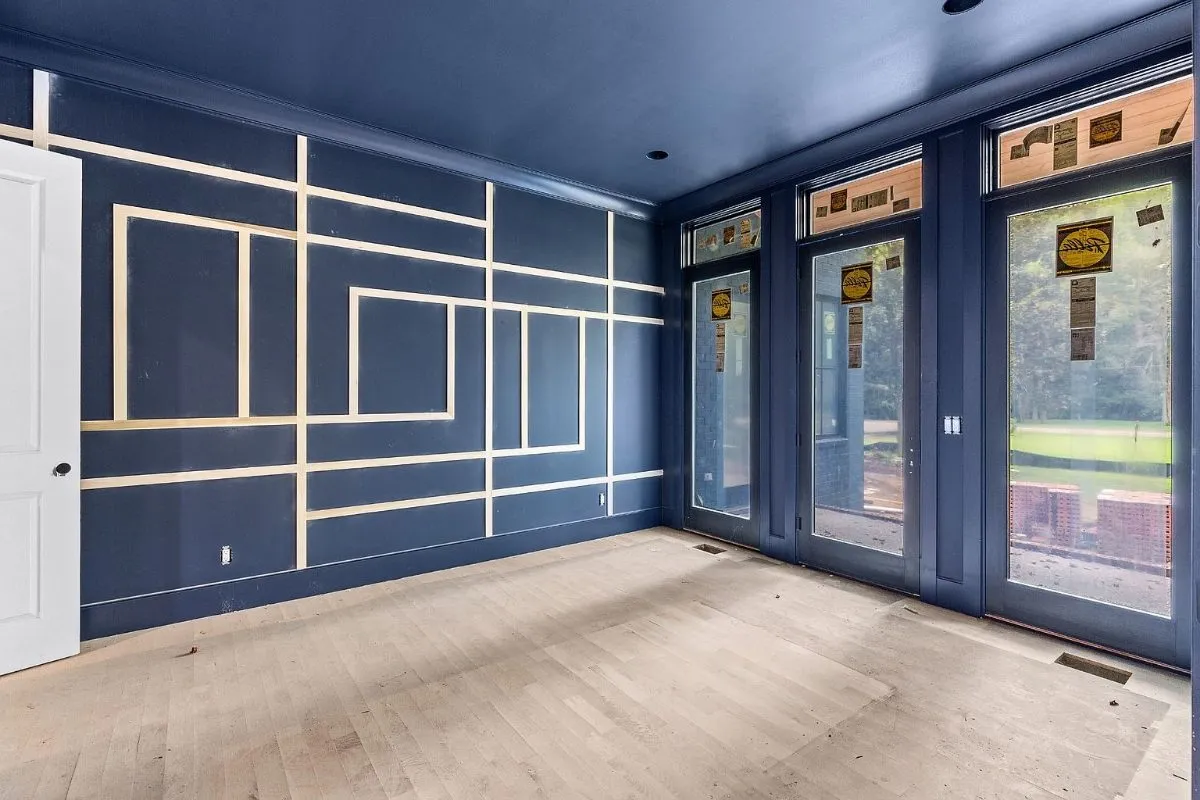 Navy study with trim work and French doors, in progress