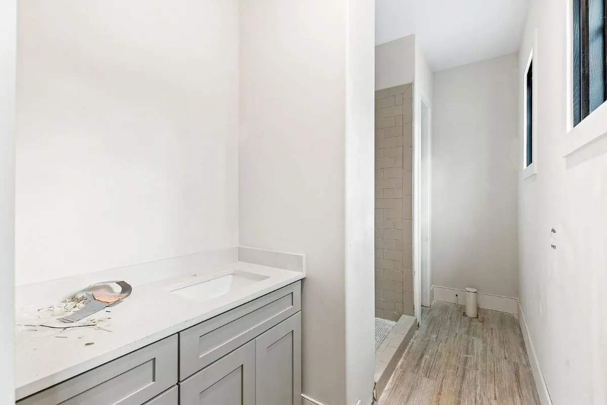 Bathroom vanity with a quartz top, during finishing